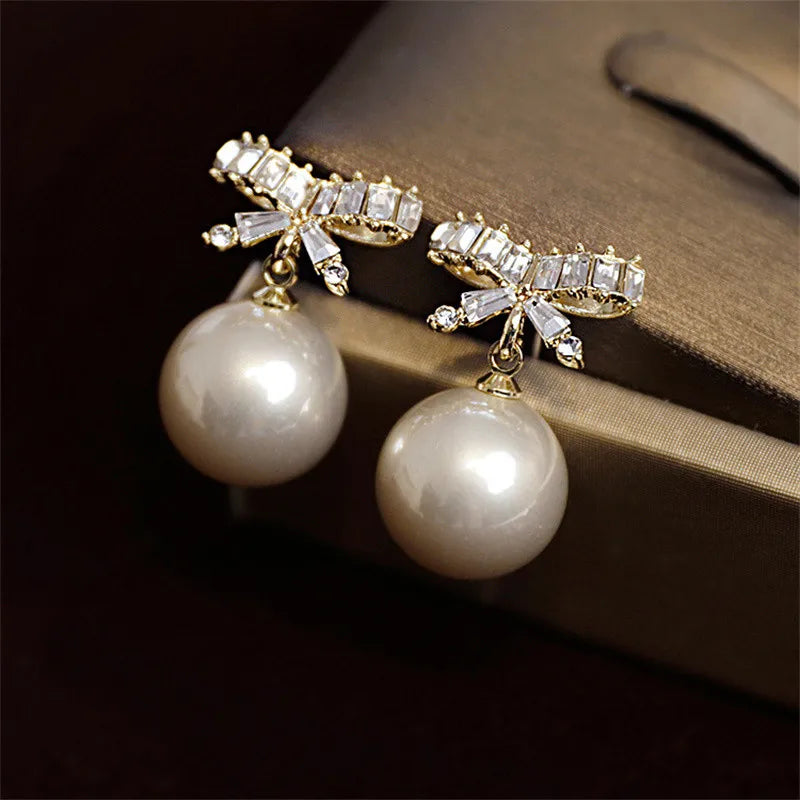 Elegant Crystal Bow Knot Drop Earrings – Exquisite Red Pearl Dangle for Christmas & Party Glam ✨🎀